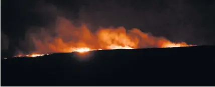  ?? Matt Gilley/Ben Birchall ?? The blaze was reported near Tavy Cleave, a few miles north-east of Tavistock and estimated to be more than three miles wide. Damaged areas are seen from Brent Tor, below, looking beyond the village of Mary Tavy