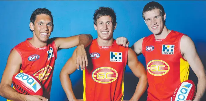  ??  ?? Harley Bennell (left) with fellow Suns 2010 draft picks David Swallow and Sam Day, and (inset below) Bennell in action for Gold Coast in 2015.