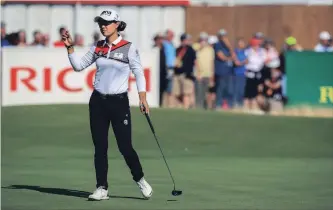  ?? PETER BYRNE THE ASSOCIATED PRESS ?? Australia’s Minjee Lee, who struggled during the first three majors of the season, grabbed the early lead at the Women’s British Open with an opening-round 7-under 65 in Lytham, England, on Thursday.