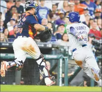  ?? AP PHOTO ?? Houston Astros catcher Juan Centeno, left, chases Toronto Blue Jays’ Darwin Barney during a rundown during the seventh inning of a baseball game, Sunday in Houston.