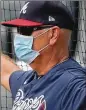  ??  ?? Says manager Brian Snitker: “We’ve got to continue to be consistent in what we’re doing, like wearing the mask (and) staying in.”