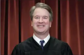  ?? J. SCOTT APPLEWHITE — THE ASSOCIATED PRESS FILE ?? In this file photo Associate Justice Brett Kavanaugh sits with fellow Supreme Court justices for a group portrait at the Supreme Court Building in Washington.