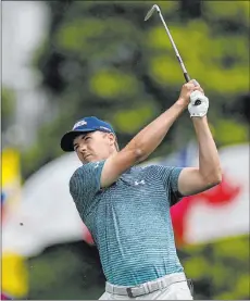  ?? Matt Slocum The Associated Press ?? Jordan Spieth sits at +750 to win the Masters after shooting a 71 in the first round, including a triple bogey on the ninth.