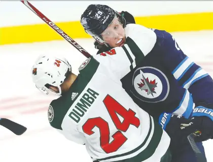  ?? KEVIN KING ?? Winnipeg Jets forward Patrik Laine probably didn’t enjoy being grabbed by Minnesota Wild defenceman Matt Dumba back in October, but says he does like facing division rivals, noting it usually results in a “heavy” game featuring big hits and strong defence.