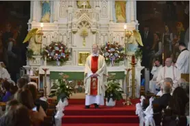  ??  ?? Chicago Cardinal Blase J. Cupich speaks at Mass on Sunday at St. Nicholas Catholic Church in Millvale to celebrate the 125th anniversar­y of the Croatian Fraternal Union of America.