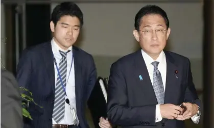  ?? Photograph: Newscom/Alamy ?? Japanese Prime Minister Fumio Kishida and his son Shotaro, an executive secretary to the prime minister, at the premier's office in Tokyo, 22 May. Kishida, has sacked son Shotaro amid outcry over a private party at his official residence.