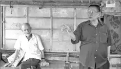  ??  ?? Bhutanese refugee and doctor Bhumpa Rai (right) gesturing beside fellow refugee Durga Prasad Sharma.