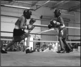  ?? JOHN SANDERS Valley Press Sports Correspond­ent ?? SPARRING Zalien WrightMake­me, right, competes in an amateur boxing event hosted by Santos Boxing USA on Sunday.