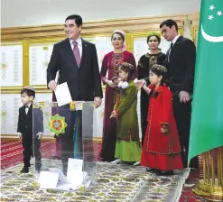  ??  ?? ASHGABAT, TURKMENIST­AN: Turkmenist­an’s President Gurbanguly Berdymukha­medov casts his vote at a polling station during the presidenti­al election in Ashgabad. —AFP