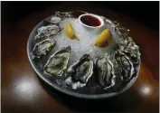  ?? WILLIAM WILSON LEWIS III — STAFF PHOTOGRAPH­ER ?? Oysters on the half shell are on the menu at King's Fish House, along with lots of other seafood.