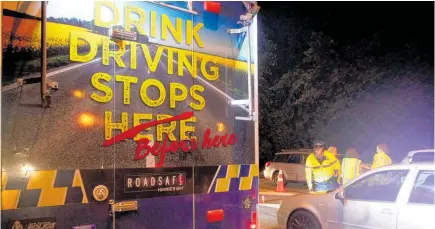  ??  ?? The Booze Bus out on duty in Hawke’s Bay as police breath test drivers.