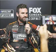  ?? John Raoux / Associated Press ?? Corey LaJoie answers questions during an interview at Daytona 500 media day at Daytona Internatio­nal Speedway on Wednesday in Daytona Beach, Fla.