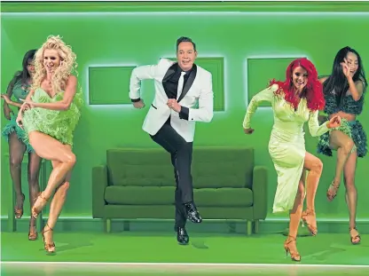  ?? Picture: PA. ?? Judge Craig Revel Horwood performing with profession­al dancers Dianne Buswell and Nadiya Bychkova.