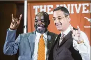  ?? AMANDA VOISARD/AMERICAN-STATESMAN ?? New track coach Edrick Floréal (left, with AD Chris Del Conte) says Texas needs to make other schools envious.