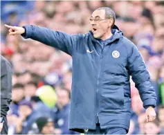  ??  ?? Maurizio Sarri is clinging to his job, seven months since his appointmen­t, after Chelsea's humiliatin­g 6-0 defeat at City, leaving them outside the Champions League qualificat­ion places. — AFP photo