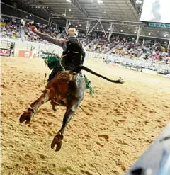  ??  ?? Tully rider Michael Smith on Jumping Jack at the Profession­al Bull Riding Tamworth Invitation­al.