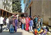  ??  ?? Unattended patients wait outside Safdarjung Hospital on Monday