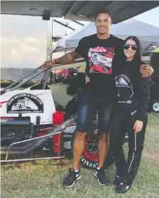  ?? ALLY PAPKO PHOTOGRAPH­Y ?? Roughrider­s defensive end Jordan Reaves and his fiancee, race car driver Amber Balcaen, have been targets for vitriol spewed by racist sports fans.