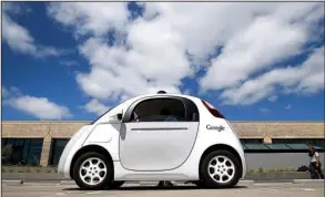  ?? AP/TONY AVELAR ?? Google’s new self-driving car is displayed during a demonstrat­ion at the Google campus in Mountain View, Calif., in this file photo.