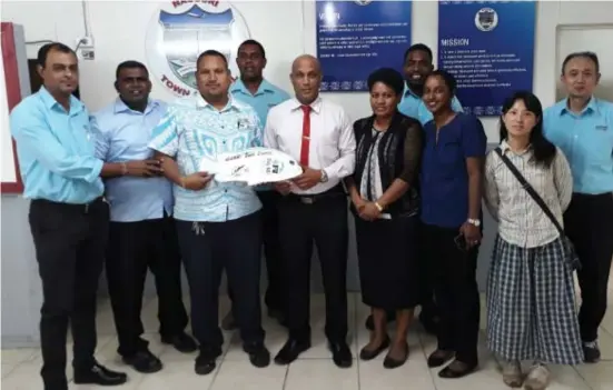  ?? Photo: cChange ?? Nausori Town Council staff with Ministry of Fishries staff during the pledging ceremony.