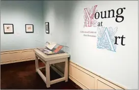  ?? DANA JENSEN/ THE DAY ?? One of the three gallery spaces devoted to the exhibit “Young at Art: A Selection of Caldecott Book Illustrati­ons” at the Lyman Allyn Art Museum in New London.