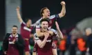  ?? Mercer/MB Media/Getty Images ?? Mark Noble leaps on Declan Rice after West Ham’s Europa League last-16 victory over Sevilla in March. Photograph: Craig