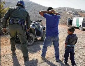  ?? JAE C. HONG / AP FILE ?? California will introduce group trials for people charged with entering the country illegally. Federal prosecutor­s in Arizona, Texas and New Mexico have long embraced these hearings as more efficient.
