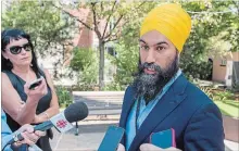  ?? RYAN REMIORZ THE CANADIAN PRESS ?? NDP Leader Jagmeet Singh speaks to the media about the internal investigat­ion that exonerated MP Christine Moore.