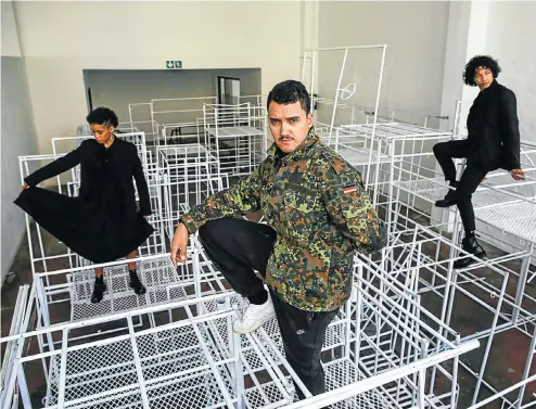  ?? Picture: Simphiwe Nkwali ?? ON THEIR METTLE Robin Rhode, centre, and fellow performanc­e artists Maxime Scheepers and Kevin Narain in Rhode’s Jungle Gym installati­on.