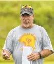  ??  ?? New Bangor Slaters coach Paul Reduzzi talks to his team during a practice on Wednesday.