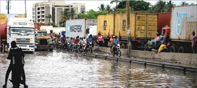  ??  ?? Climate change; fallout of a downpour on Apapa-Oshodi Expressway in Lagos