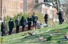  ?? REUTERS ?? MOURNERS attend a funeral at The Green-Wood Cemetery during the outbreak of the coronaviru­s disease 2019 (COVID-19) in the Brooklyn borough of New York City, New York, US, April 11.