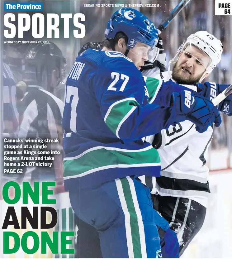  ?? — THE CANADIAN PRESS ?? The Vancouver Canucks’ Ben Hutton and Los Angeles Kings’ Kyle Clifford collide along the boards during Tuesday’s game at Rogers Arena.