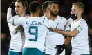  ?? Joe Giddens/PA ?? Riyad Mahrez (centre) celebrates with his Manchester City teammates after opening the scoring at Peterborou­gh. Photograph: