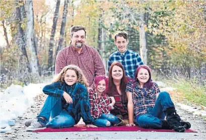  ?? THE CANADIAN PRESS ?? The Grunleitne­rs — Leo, left, Manfred, Tessa, Sandy, Dave and Miley — from Okotoks, Alta., were able to rebook their campsite reservatio­ns this month after parks in Alberta reopened at half capacity. “You had to be really patient and keep trying,” Sandy said.