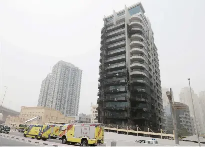  ?? KT file photo ?? dubai’s civil defence teams quickly put out the Zen Tower fire, which broke out on may 13 from a ground floor kitchen. —