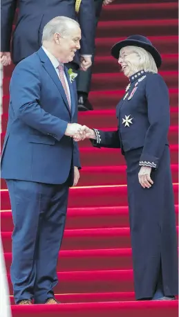  ?? DARREN STONE, TIMES COLONIST ?? Lt.-Gov. Judith Guichon greets Premier John Horgan on the steps of the legislatur­e before delivering the speech from the throne on Tuesday.