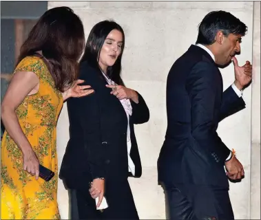  ??  ?? NEXT TO ARRIVE: Chancellor Rishi Sunak with fellow guests makes his entrance at the Wallace Collection