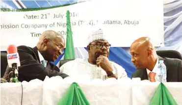  ??  ?? From left: Minister of Power, Works & Housing, Mr Babatunde Fashola, Minister of State in the Ministry, Hon. Mustapha Baba Shehuri and Ag.Managing Director/CEO Nigerian Bulk Electricit­y Trading Plc (NBET), Mr. Waziri Bintube during the signing ceremony...