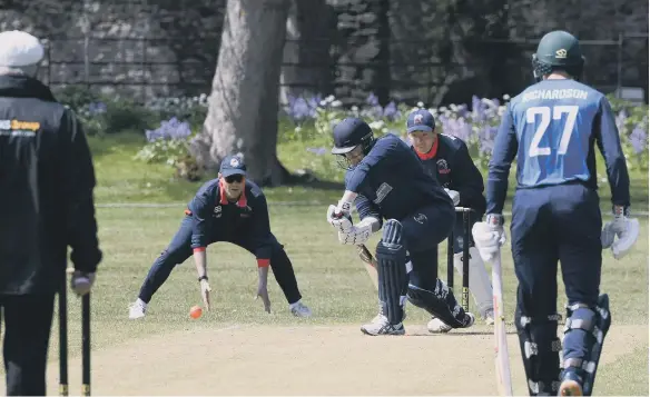  ??  ?? Whitburn batsman Gareth Welsh batting against South Northumber­land at at Whitburn on Saturday, watched by wicket-keeper Michael Richardson.