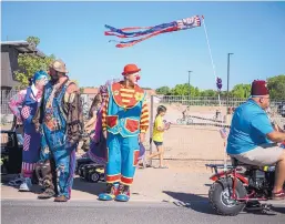  ??  ?? Participan­ts line up for the Fourth of July Parade in Corrales on Thursday.