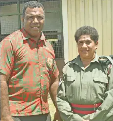  ?? Photo: Mereleki Nai ?? Staff Sergeant Luisa Lotawa with her husband, Pastor Taniela Lotawa at the Black Rock training ground in Nadi.