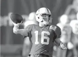  ?? Associated Press ?? n Indianapol­is Colts quarterbac­k Scott Tolzien throws during practice at the NFL team's football training camp Wednesday in Indianapol­is.