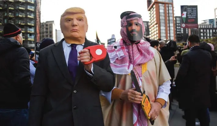  ??  ?? Palestine supporters gather outside the American Embassy in London as a protest is held against the proposed peace deal for the Middle East by President Donald Trump.