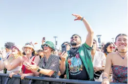  ?? AP ?? Festivalgo­ers are seen during the the first weekend of the Coachella Valley Music and Arts Festival at the Empire Polo Club on Saturday, in Indio, California.