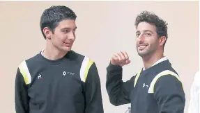  ??  ?? Renault drivers Esteban Ocon, left, and Daniel Ricciardo.