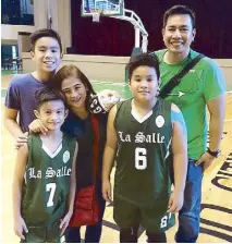  ??  ?? Vanni and Maricel Jugo with their sons Camilo (left) and Javi, who played for Dela Salle Greenhills’ SBP team, and big brother Julian who played for Dela Salle’s Passerelle team