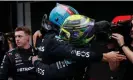  ?? ?? Russell and Lewis Hamilton embrace after the race. Photograph: Amanda Perobelli/Reuters