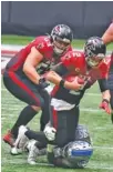  ?? AP PHOTO/ BRYNN ANDERSON ?? Detroit Lions defensive end Romeo Okwara (95) sacks Atlanta Falcons quarterbac­k Matt Ryan (2) on Oct. 25 in Atlanta.