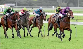  ?? RACE IMAGES ?? Lincoln Blue and Masa Tanaka race away from their rivals in the Wellington Stakes at Otaki.
